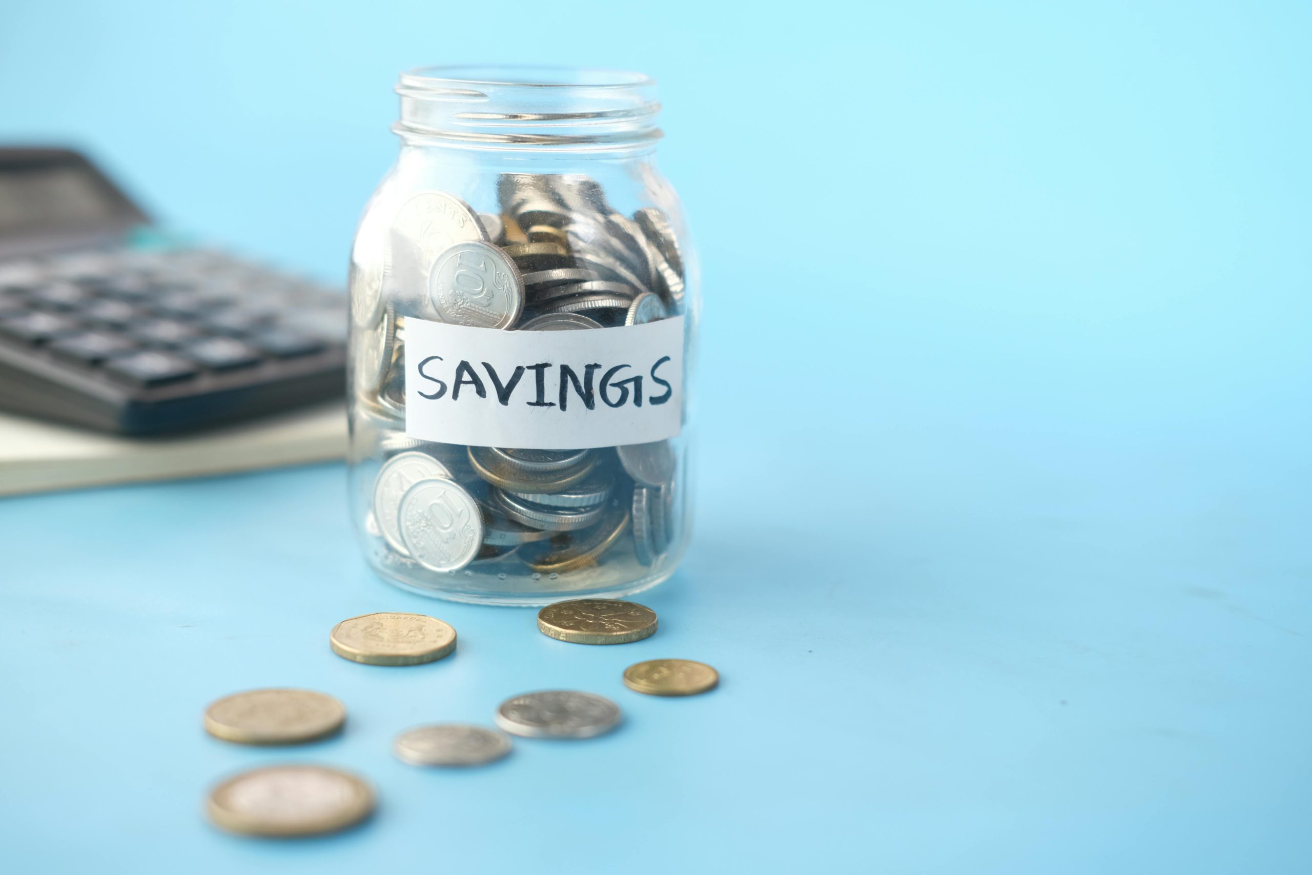 how to save with no income | glass jar with pennies