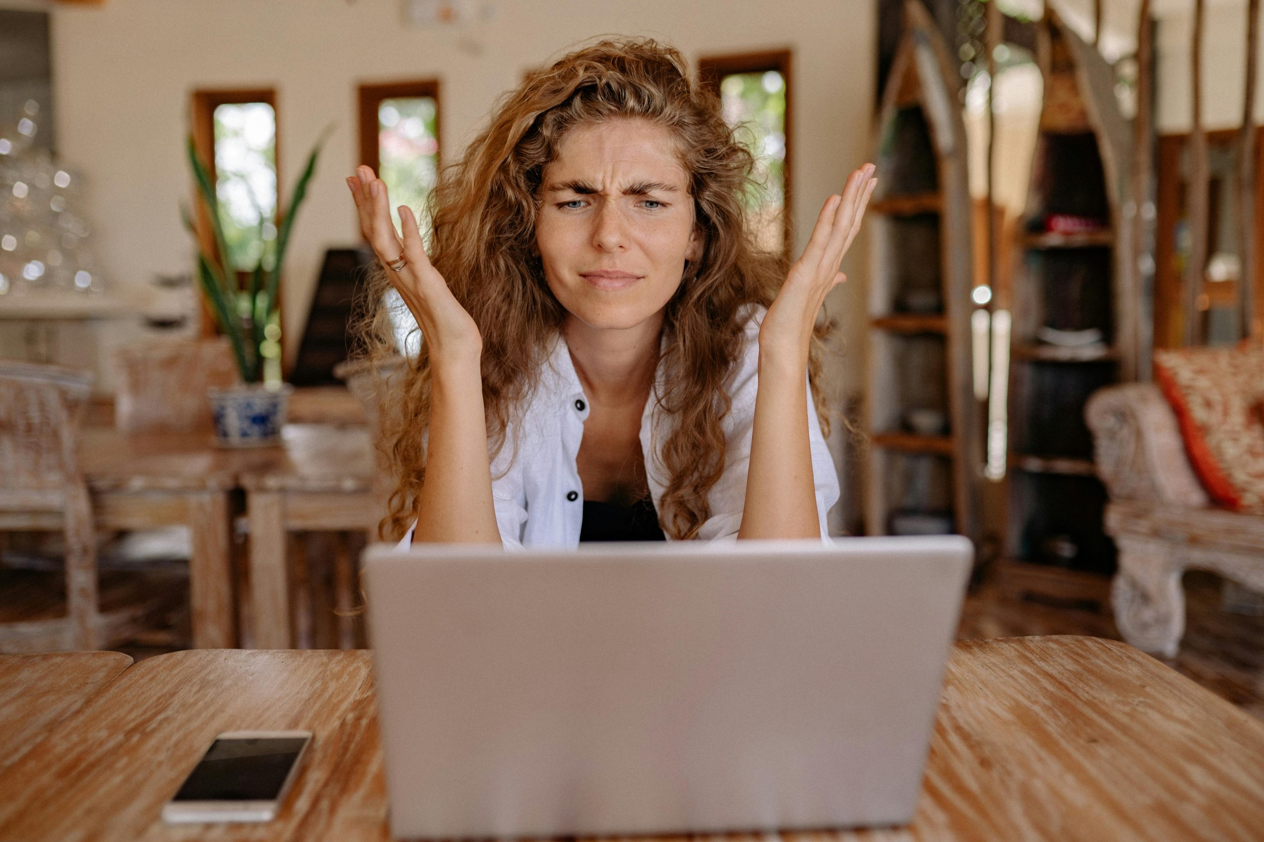 frustrated woman in front of laptop | make money online